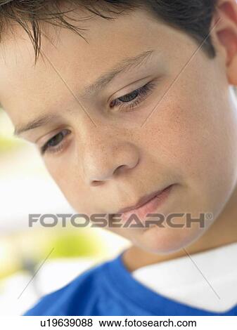 Portrait Of Boy Looking Unhappy View Large Photo Image Stock Photo - Portrait Of Boy Looking Unhappy. Fotosearch
