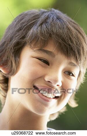 Stock Image - Portrait Of Boy Smiling. Fotosearch