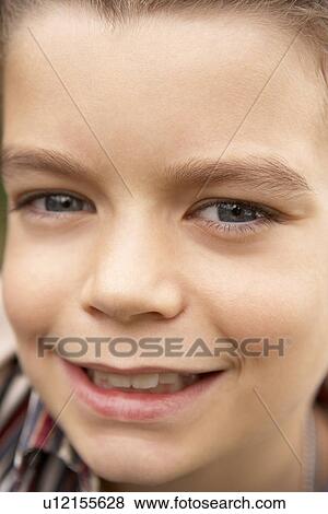 Stock Photo - Portrait Of Boy Smiling. Fotosearch