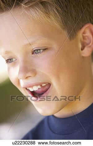Stock Photo - Portrait Of Boy Smiling. Fotosearch