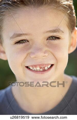Stock Photo - Portrait Of Boy Smiling. Fotosearch