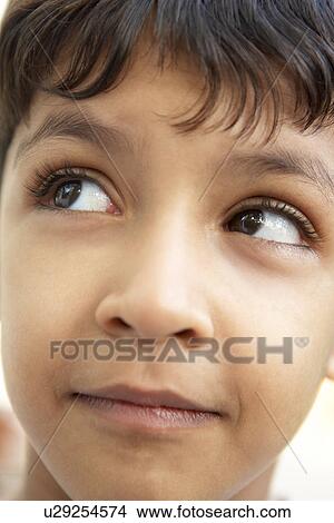 Picture - Portrait Of Boy Thinking. Fotosearch