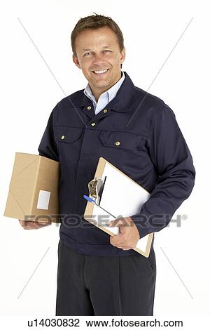 Stock Image - Portrait Of Courier Holding A Parcel And Clipboard. Fotosearch