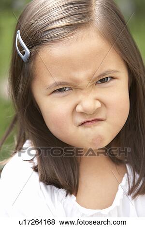 Portrait Of Girl Frowning View Large Photo Image Stock Photo - Portrait Of Girl Frowning. Fotosearch