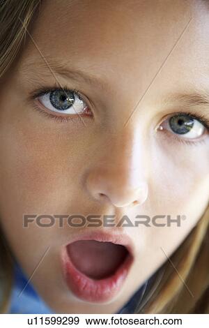 Portrait Of Girl Looking Surprised View Large Photo Image Stock Photo - Portrait Of Girl Looking Surprised. Fotosearch