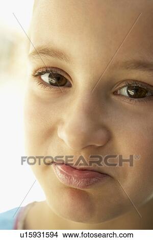Picture - Portrait Of Girl Pouting. Fotosearch
