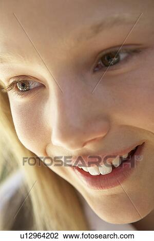 Stock Image - Portrait Of Girl Smiling. Fotosearch