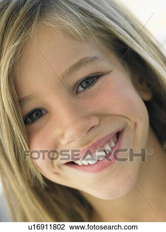 Stock Image - Portrait Of Girl Smiling. Fotosearch