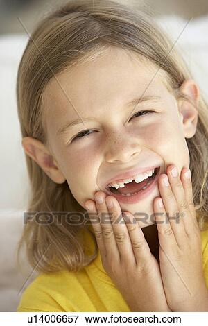 Stock Photo - Portrait Of Girl Smiling. Fotosearch