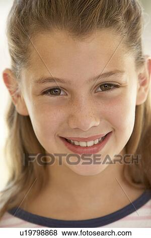 Stock Photo - Portrait Of Girl Smiling. Fotosearch