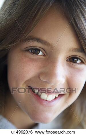 Stock Photograph - Portrait Of Girl Smiling. Fotosearch