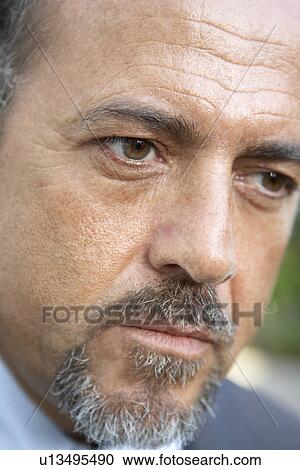 Portrait Of Middle Aged Man Looking Serious View Large Photo Image Stock Image - Portrait Of Middle Aged Man Looking Serious. Fotosearch