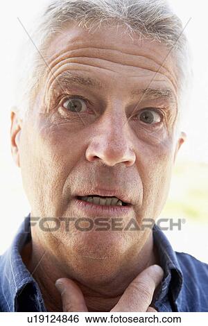 Portrait Of Middle Aged Man Looking Surprised View Large Photo Image Stock Photograph - Portrait Of Middle Aged Man Looking Surprised. Fotosearch
