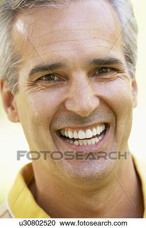 Portrait Of Middle Aged Man Smiling At The Camera View Large Photo Image Stock Image - Portrait Of Middle Aged Man Smiling At The Camera. Fotosearch
