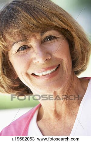 Portrait Of Middle Aged Woman Smiling At The Camera View Large Photo Image Stock Image - Portrait Of Middle Aged Woman Smiling At The Camera. Fotosearch