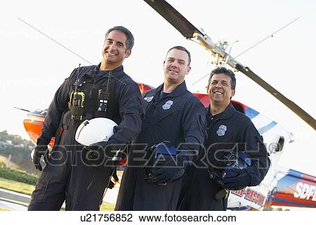 Portrait of paramedics standing in front of Medevac View Large Photo Image Stock Image - Portrait of paramedics standing in front of Medevac. Fotosearch