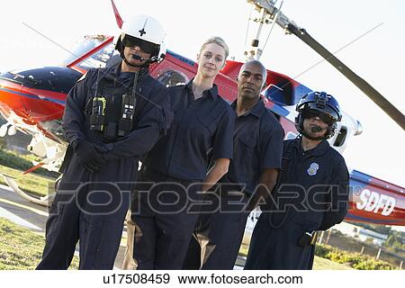 Portrait of paramedics standing in front of Medevac View Large Photo Image Stock Photo - Portrait of paramedics standing in front of Medevac. Fotosearch