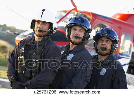 Portrait of paramedics standing in front of Medevac View Large Photo Image Stock Photograph - Portrait of paramedics standing in front of Medevac. Fotosearch