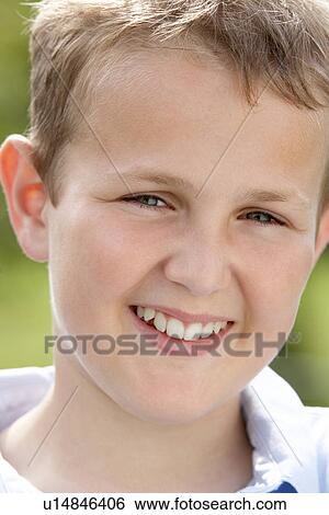Stock Photograph - Portrait Of Pre-Teen Boy Smiling. Fotosearch