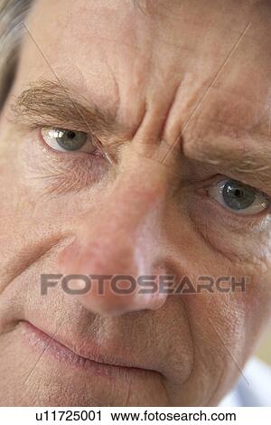 Portrait Of Senior Man Frowning At The Camera View Large Photo Image Stock Image - Portrait Of Senior Man Frowning At The Camera. Fotosearch