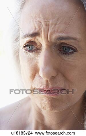 Portrait Of Senior Woman Looking Anxious View Large Photo Image Picture - Portrait Of Senior Woman Looking Anxious. Fotosearch