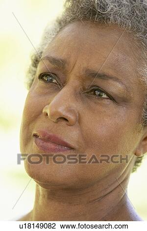 Stock Image - Portrait Of Senior Woman Looking Anxious. Fotosearch
