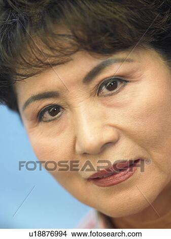 Picture - Portrait Of Senior Woman Looking At The Camera. Fotosearch