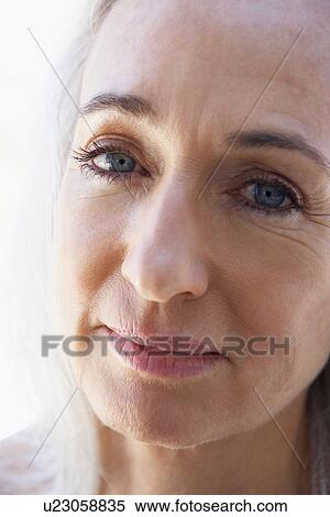 Stock Photography - Portrait Of Senior Woman Looking At The Camera. Fotosearch