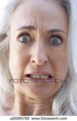 Portrait Of Senior Woman Looking Shocked View Large Photo Image Stock Photo - Portrait Of Senior Woman Looking Shocked. Fotosearch