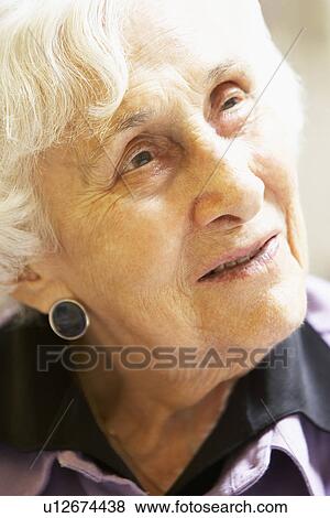 Portrait Of Senior Woman Looking Thoughtful View Large Photo Image Stock Photo - Portrait Of Senior Woman Looking Thoughtful. Fotosearch