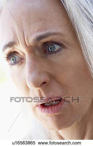 Stock Photography - Portrait Of Senior Woman Looking Upset. Fotosearch