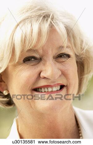 Portrait Of Senior Woman Smiling At The Camera View Large Photo Image Stock Image - Portrait Of Senior Woman Smiling At The Camera. Fotosearch