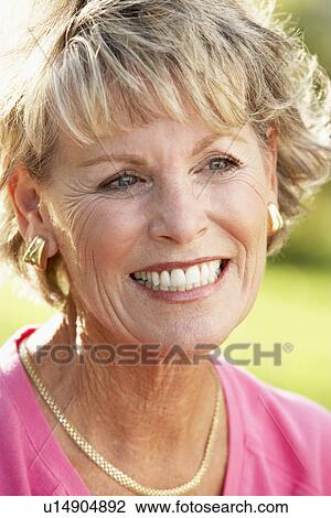 Portrait Of Senior Woman Smiling Happily View Large Photo Image Stock Image - Portrait Of Senior Woman Smiling Happily. Fotosearch