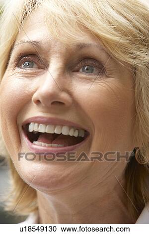 Portrait Of Senior Woman Smiling Happily View Large Photo Image Stock Image - Portrait Of Senior Woman Smiling Happily. Fotosearch