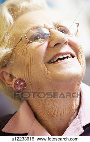 Portrait Of Senior Woman Smiling Happily View Large Photo Image Stock Photograph - Portrait Of Senior Woman Smiling Happily. Fotosearch