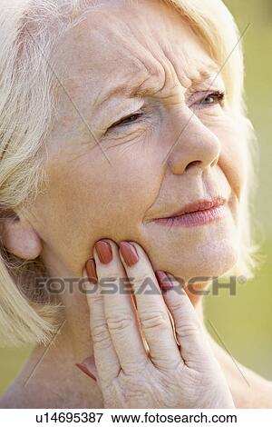 Portrait Of Senior Woman With A Toothache View Large Photo Image Stock Photo - Portrait Of Senior Woman With A Toothache. Fotosearch