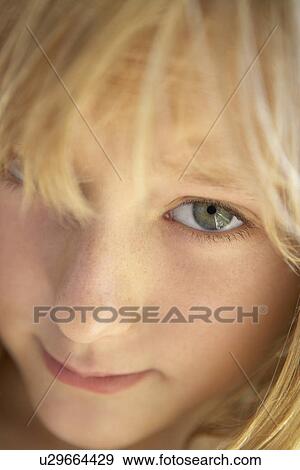 Stock Photo - Portrait Of Shy Girl. Fotosearch