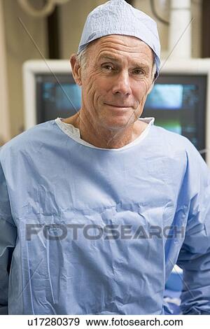 Portrait Of Surgeon In Surgical Scrubs View Large Photo Image Stock Photo - Portrait Of Surgeon In Surgical Scrubs. Fotosearch
