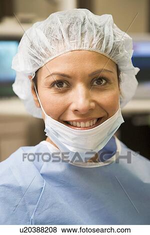 Stock Photo - Portrait Of Surgeon In Surgical Scrubs. Fotosearch