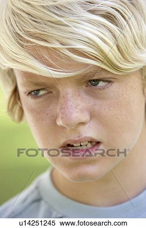 Portrait Of Teenage Boy Looking Angry View Large Photo Image Stock Photography - Portrait Of Teenage Boy Looking Angry. Fotosearch
