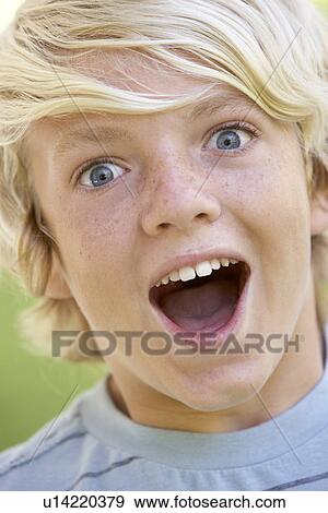 Stock Photo - Portrait Of Teenage Boy Looking Excited. Fotosearch