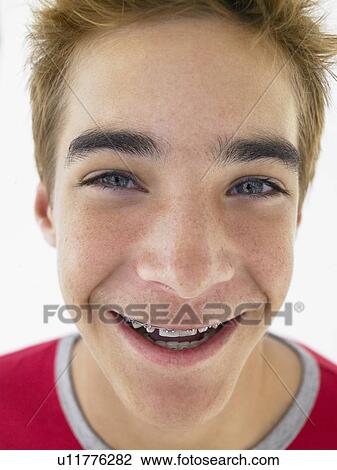 Portrait Of Teenage Boy Smiling View Large Photo Image Stock Image - Portrait Of Teenage Boy Smiling. Fotosearch