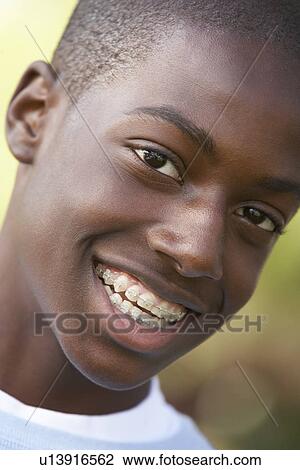 Portrait Of Teenage Boy Smiling View Large Photo Image Stock Image - Portrait Of Teenage Boy Smiling. Fotosearch