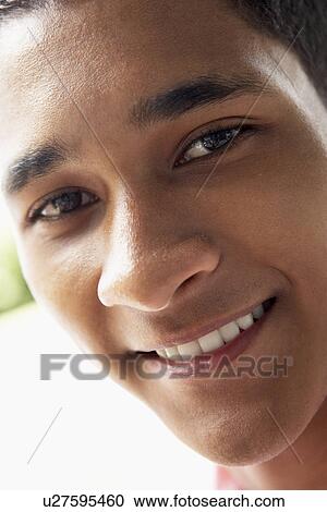 Stock Image - Portrait Of Teenage Boy Smiling. Fotosearch