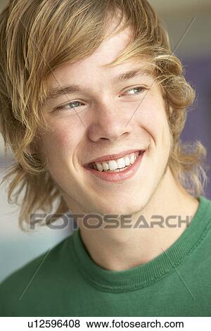 Stock Photo - Portrait Of Teenage Boy Smiling. Fotosearch