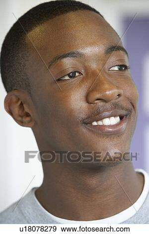 Stock Photo - Portrait Of Teenage Boy Smiling. Fotosearch