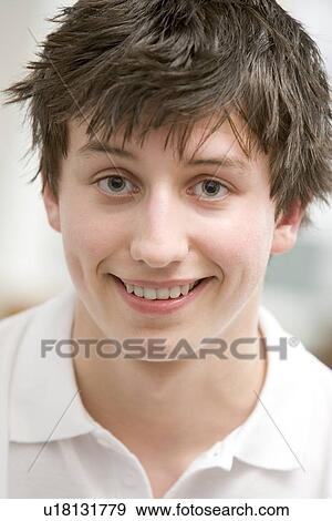 Stock Photo - Portrait Of Teenage Boy Smiling. Fotosearch