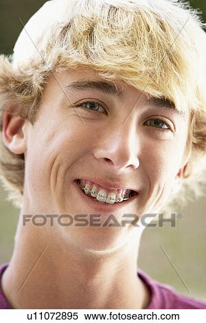 Stock Photography - Portrait Of Teenage Boy Smiling. Fotosearch