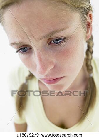 Portrait Of Teenage Girl Frowning View Large Photo Image Stock Photo - Portrait Of Teenage Girl Frowning. Fotosearch