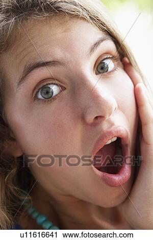 Stock Image - Portrait Of Teenage Girl Looking Shocked. Fotosearch